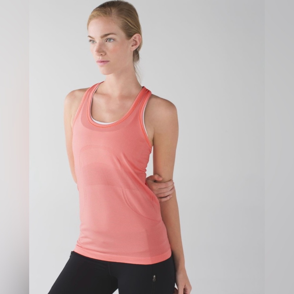 Lululemon swiftly tech tank size 4 in a grapefruit/coral colour